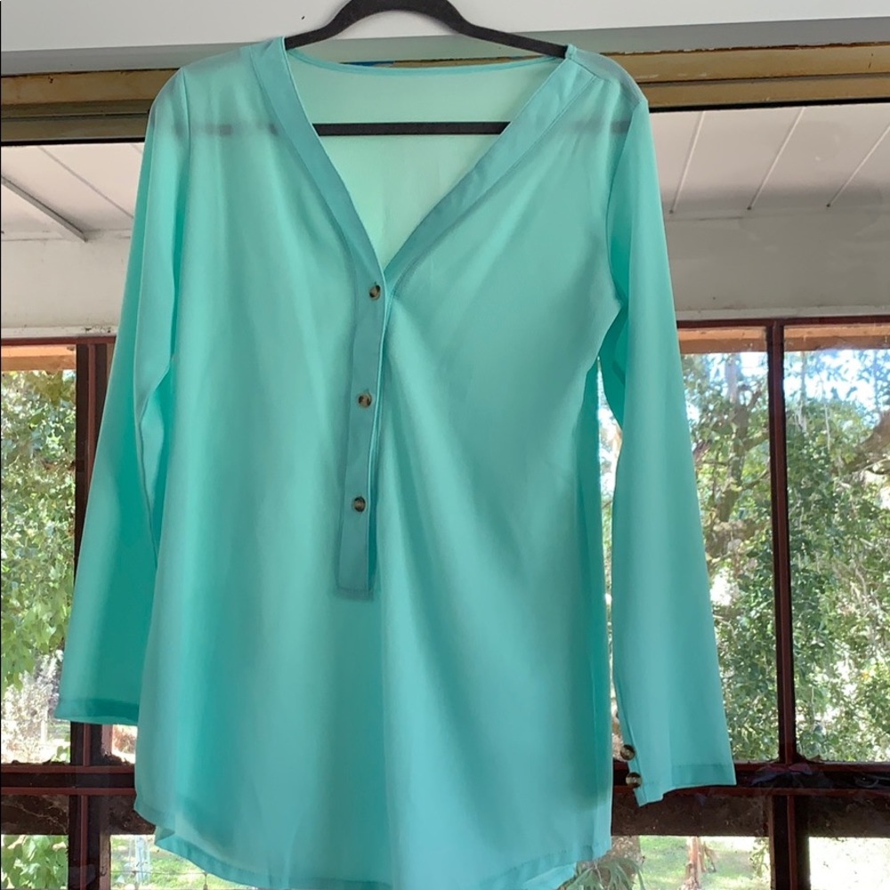 Women’s teal tunic size small